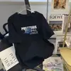 Camiseta de manga corta de estilo americano moderna para hombre, cuello redondo de verano, versátil casual, nuevo estilo 2025, marca de moda, camiseta holgada estilo Hong Kong