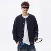 Moda de otoño e invierno para hombre: Cárdigan de punto trenzado de color liso con un estilo relajado y sin esfuerzo, perfecto para crear un look versátil y cómodo