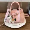 Moda transfronteriza 2026 primavera nuevo bolso de mano casual personalizado simple bolso cubo moderno bolso de hombro cruzado