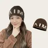 Gorro de punto estilo coreano ins con letras y lana, nuevo, moderno y genial, sombrero de lana suave y cálido para mujer en otoño e invierno