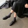 Zapatos de Cuero Negro Estilo Neutro Atractivo Otoño 2026 Nuevos Zapatos de Cuero para Uniforme con Remaches Estilo Academia Correa Cruzada Cuero Genuino