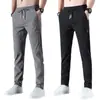 Pantalones deportivos finos de verano, de secado rápido, de seda de hielo para hombre, para primavera y otoño, para exteriores, holgados, de talla grande, para trabajo, montañismo, informales.