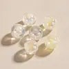 25 cuentas de corazón de caramelo con destellos finos de 12 MM para pulsera DIY, cadena de teléfono móvil, accesorios de cuentas de barril de resina transparente al por mayor