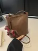 Bolso de Cubo Retro de Cuero Suave Transfronterizo para Mujer Nuevo Estilo 2026 Bolso de Hombro Elegante con un Toque de Alta Gama para Viajes Diarios y Uso Cruzado