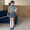 Ropa de Verano Estilo Coreano para Niñas 2026 Nueva Camisa a Cuadros sin Mangas Falda de Mezclilla Falda Corta Moda Falda Camiseta para Niños Mayores