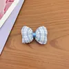 Tela de cuadros florales del fabricante Adornos de lazo hechos a mano Accesorios Adornos para mascotas Correas Chalecos Accesorios de ropa