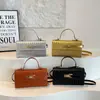 Bolso de moda para mujer, nuevo y moderno 2026, bolso pequeño cuadrado de un solo hombro, alta calidad, versátil, bolso cruzado casual tipo Kelly