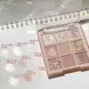 Dikalu flash edición limitada de Navidad princesa de hielo full Flash diamante plato de sombras de ojos de nueve colores 25 Bola de Nieve Perla
