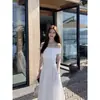 668 # Vestido negro de dos piezas fuera del hombro para mujer, 2026 vestido largo de alta gama elegante fuera del hombro que marca la cintura, vestido sin tirantes