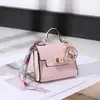 Nova Mini Bolsa Kelly Chaveiro Pingente Portátil Corda de Mão Fone de Ouvido Bluetooth Bolsa Bolsa de Moedas Multifuncional Bolsa Pequena