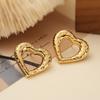 Pendientes de amor huecos de oro de 18 quilates chapados en cobre con personalidad simple, venta caliente transfronteriza entre Australia, Europa y Estados Unidos, pendientes punk de nicho para mujer