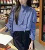 Camisa de manga larga con lazada de nicho para mujer otoño 2026 nueva suelta adelgazante estilo coreano camisa a cuadros