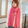 Bufanda de mujer otoño e invierno popular en Corea del Sur color liso cachemira punto lana bufanda hombres y mujeres todo a juego venta al por mayor de fábrica