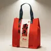 2026 Ano do Cavalo Bolsa de Feltro Novo Estilo Chinês Bolsa de Presente Vermelha Bolsa Tote para Reunião Anual da Empresa com Impressão de Logo