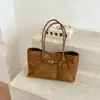 Bolso bandolera retro de gran capacidad versátil transfronterizo para mujer, nuevo bolso de mano versátil para trabajo y desplazamientos Otoño/Invierno 2026