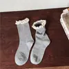 Calcetines de encaje hueco estilo coreano estilo Miu estilo japonés dulce estilo medio calcetines de tubo estilo niña algodón peinado calcetines apilables para mujer estilo primavera otoño e invierno