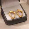 Pendientes de acero inoxidable de estilo ins Europa y Estados Unidos transfronterizos para mujer, sentido de alta calidad, horno 18K, pendientes lisos irregulares, no se decoloran