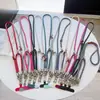 Diagonal Transfronteiriça Duas em Uma Cordão Longo para Celular de Pulso Destacável Fivela de Metal Corda de Segurança Emenda Artefato Anti-Perda