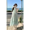 Un dulce vestido de verano sin mangas con cuello halter de menta yikett para mujer, de temperamento veraniego, largo y ajustado