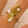 Anel de Aço Inoxidável com Pérola de Zircônia Estilo Oceano Cruzado Europeu e Americano Anel de Estrela do Mar Concha Búzio Joia de Mão Elegante para Mulheres