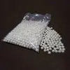 Accesorios para joyería DIY Perla de Imitación ABS beige blanco puro agujero recto Perla no porosa Perla agujero pasante doble agujero cuentas sueltas venta al por mayor