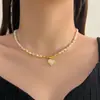 Collar de perlas de doble capa estilo retro francés para mujer, ligero, lujoso, de alta gama, con cadena para el cuello.