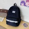 Mochila de estilo ins coreano estilo universitario con lunares de alta apariencia para estudiante de secundaria, mochila de viaje dulce estilo chica suave con encaje