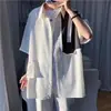 Camisa de Manga Corta para Hombre 2026 Verano Nueva Marca de Moda Alta Gama Holgada Color Liso Camisa de Trabajo