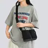 Bolso de hombro de nailon nuevo 2026 para mujer, bandolera simple y casual, gran capacidad, versátil para ir al trabajo y con estilo deportivo.