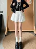 Falda de lunares blancos para mujer, nuevo estilo otoño 2026, dulce y femenina, de cintura alta, adelgazante, línea A, falda abullonada de capas