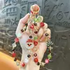 Creativa Nueva Cadena de Teléfono Móvil con Abalorios y Llavero Colgante de Bolsito Lindo de Papá Noel Incrustado de Diamantes Árbol de Navidad Venta al por Mayor