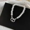 Pulsera de perlas con nariz de cerdo de circón vintage estilo francés, sensación de lujo ligero y alta gama, versátil, elegante, única y a la moda