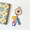 Llavero de aleación con diseño de Doraemon, diseño de niña, con cascabeles y gato azul, colgante para bolso, adorno colgante para pareja de Doraemon.