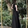 Vestido Preto High-End Sem Mangas com Decote Halter para Mulheres 2025 Verão Novo Estilo Estilo Francês Fenda Cintura Saia Longa
