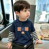 Camiseta de manga larga para niño, nuevo modelo primavera y otoño 2026, camiseta básica holgada para niños, top a rayas para niños, otoño