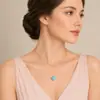 Joyería de moda retro europea y americana para mujer, collar simple de doble capa con colgante de corazón de durazno natural de turquesa con anillo de la suerte número 8