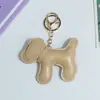 Huayang Couro PU Cachorrinho Fofo Bolsa Pingente Chaveiro Cachorro Acessório de Bolsa Pingente DIY Cordão para Celular