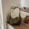 Bolsa Textura Trançada de Nicho Feminina 2026 Nova Verão Retrô Toque de Luxo Bolsa de Ombro Único para o Trabalho Transversal Bolsa Meia-Lua