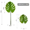 Venta caliente de Amazon hojas tropicales artificiales flores plantas verdes con césped floral decoración del hogar manualidades de plantas verdes