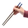 Palillos de madera para alitas de pollo al por mayor regalo palillos de metal grabado restaurante palillos para una persona uso en comidas palillos sin laca