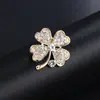 Broche acrílico moda broche de trevo de quatro folhas Pino de liga de resina banhado a ouro pino de lapela acessórios de casamento atacado