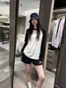 Camiseta básica simples de manga comprida com mangas raglan para mulheres, adequada para primavera e outono, apresentando um design color-block, corte solto, versátil e pode ser usada como camada base ou top casual.