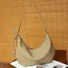 Couro Genuíno Mais Vendido Nova Bolsa Feminina TOGO Couro Bovino Camada Superior Bolsa Meia-Lua Moda Feminina Bolsa de Ombro Único Bolsa de Axila Bolsa para o Dia a Dia Bolsa Bolinho