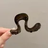 Pinza para el cabello de tamaño mediano de lunares blancos y negros estilo francés, diseñada para la parte trasera de la cabeza, un accesorio para el cabello nuevo y elegante con un aspecto sofisticado y con estilo