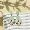 Aretes geométricos de gota de agua de venta caliente transfronteriza para mujer, aretes de cala hechos a mano de arcilla polimérica suave, aretes de alto sentido, venta al por mayor de fábrica