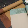 Papel de arroz batik al por mayor pantalla de color copla de papel de arroz siete palabras cinco palabras obras de caligrafía a pincel con cuatro pies de separación