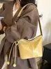 Bolso retro simple transfronterizo para mujer 2026 nuevo bolso de hombro cruzado casual versátil para el trabajo y los desplazamientos bolso tipo cubo