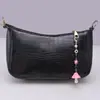 Llavero de color coreano transfronterizo con forma de hongo, joyería, resina de dibujos animados, ojo de diablo creativo, accesorio para bolso, colgante