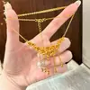 Nuevo collar de borla estilo chino con nariz de cerdo de filigrana antigua chapado en oro con cadena para la clavícula de hoja de abanico adornada con diamantes, sensación de alta gama, color duradero