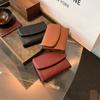 Bolso de Mujer 2026 Nuevo Estilo Cartera con Patrón de Lichi Cartera Plegable Corta para Mujer Portatarjetas de Gran Capacidad Comercio Exterior Venta al por Mayor Transfronteriza